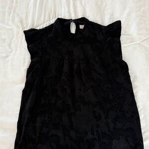 Black Sleeveless Top with Ruffle Details